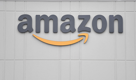 米アマゾンのロゴマーク(AFP時事)