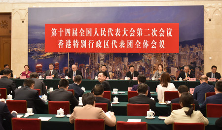中国の全国人民代表大会（全人代）の香港代表団による分科会＝６日、北京