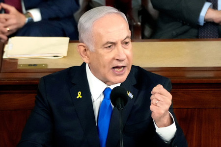 ２４日、ワシントンの米連邦議会で演説するイスラエルのネタニヤフ首相（ＡＦＰ時事）