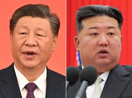 中国の習近平国家主席（左）と北朝鮮の金正恩朝鮮労働党総書記（ＡＦＰ時事）