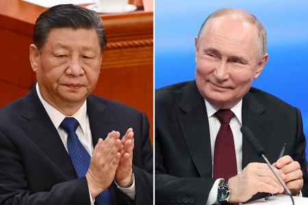 中国の習近平国家主席(左)とロシアのプーチン大統領(AFP時事)