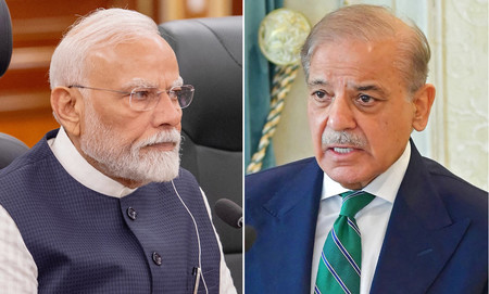 インドのモディ首相(写真左)とパキスタンのシャリフ首相(AFP時事)
