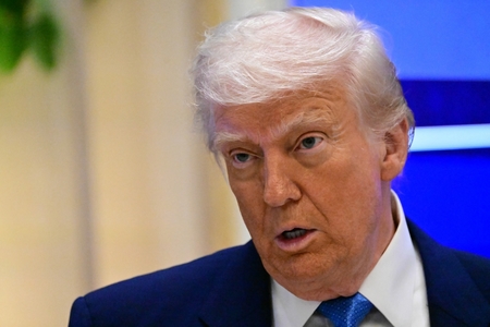 トランプ米大統領=16日、アブダビ(AFP時事)